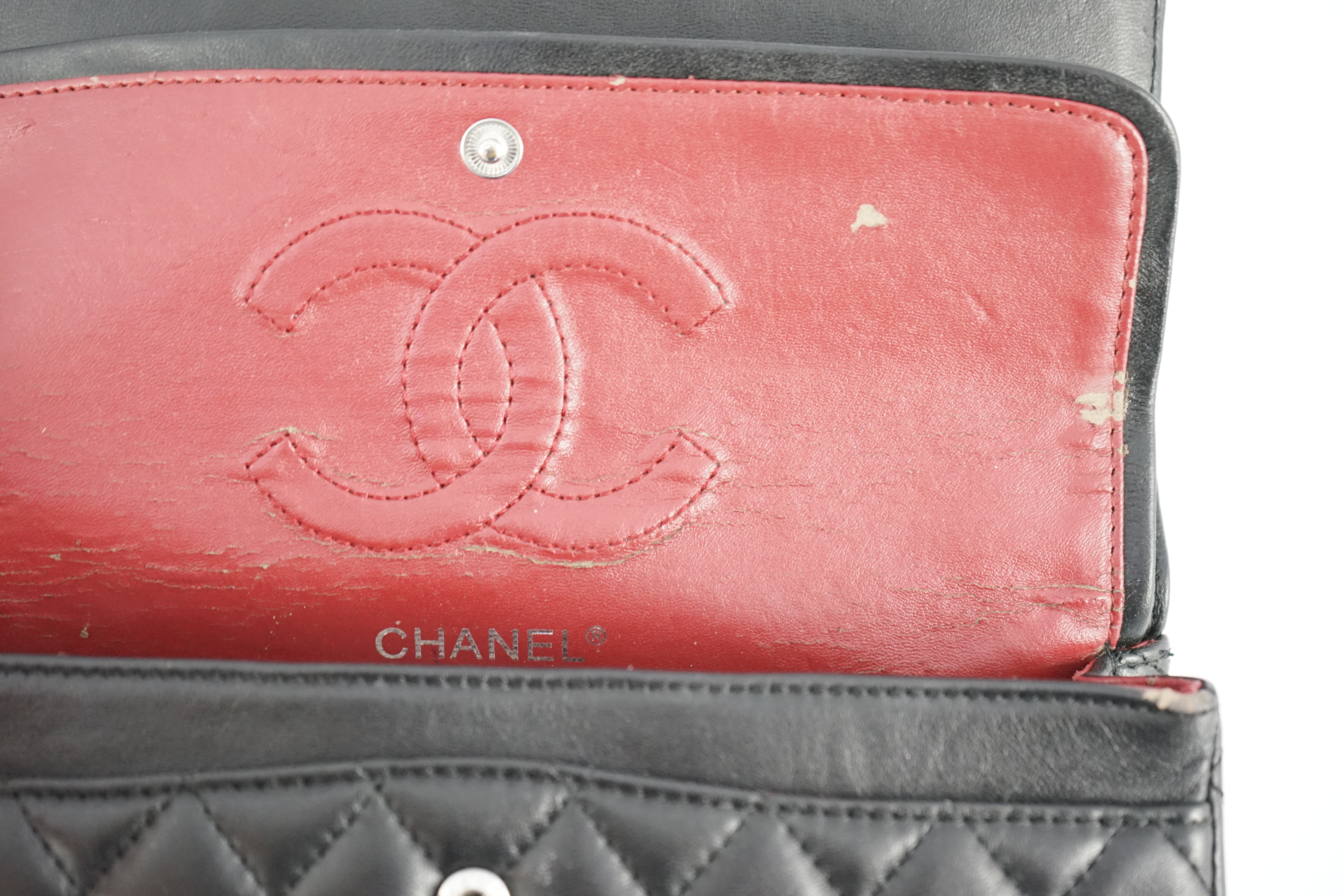 A Chanel classic black quilted leather shoulder bag width 25.5cm, depth 7cm, height 16cm